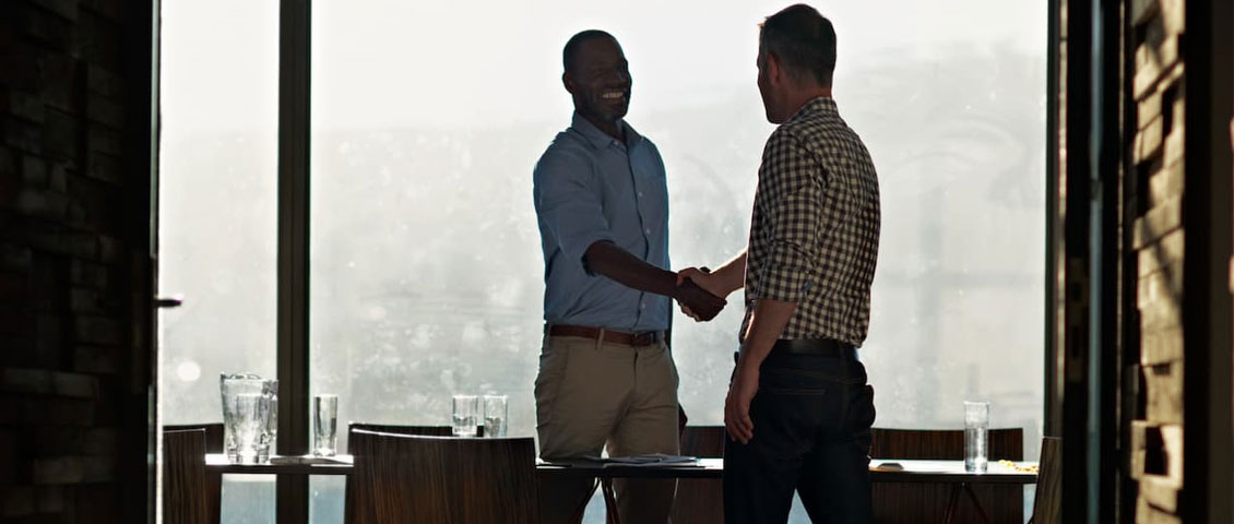 Two people shaking hands