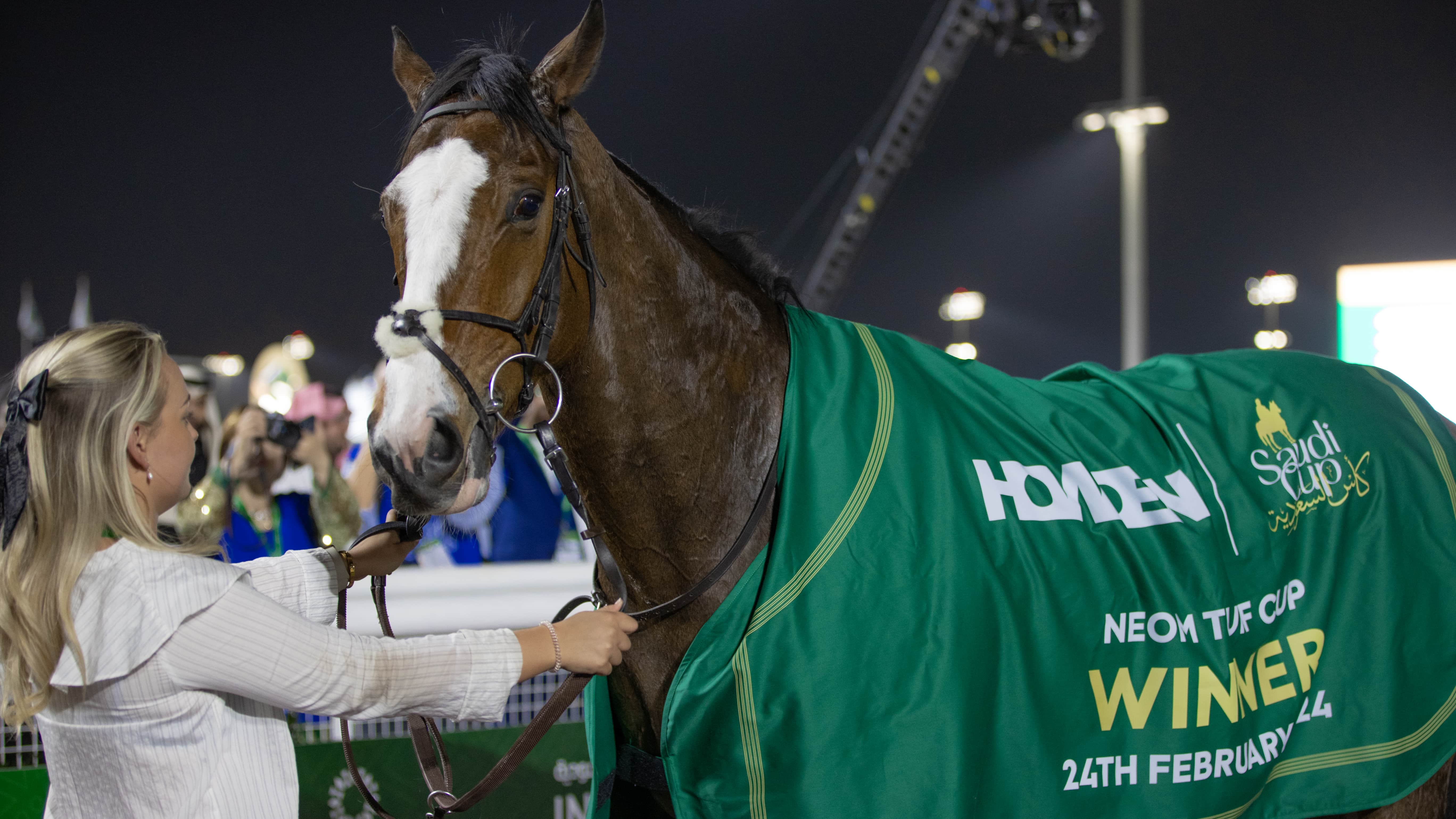 A horse wearing a Howden-branded winner's rug at the Saudi Cup
