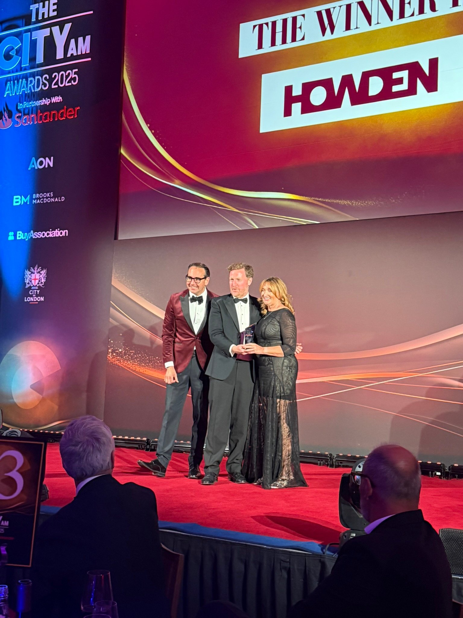 Howden colleagues on stage