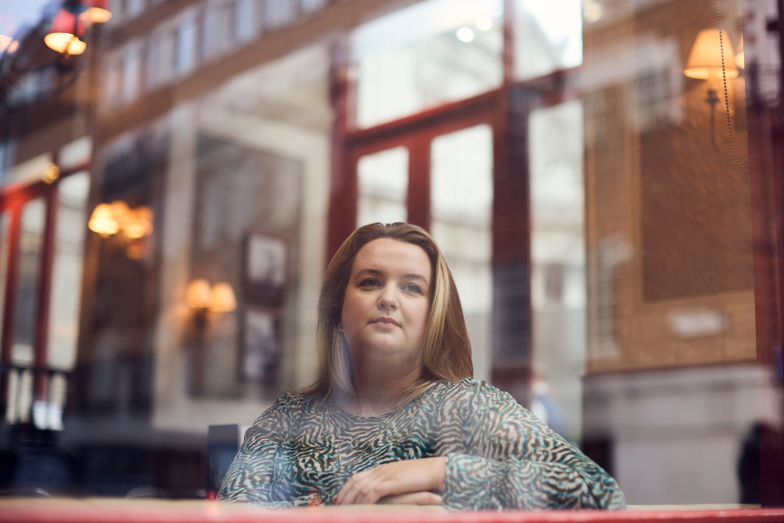 Howden's Naomi Price posing through a cafe window