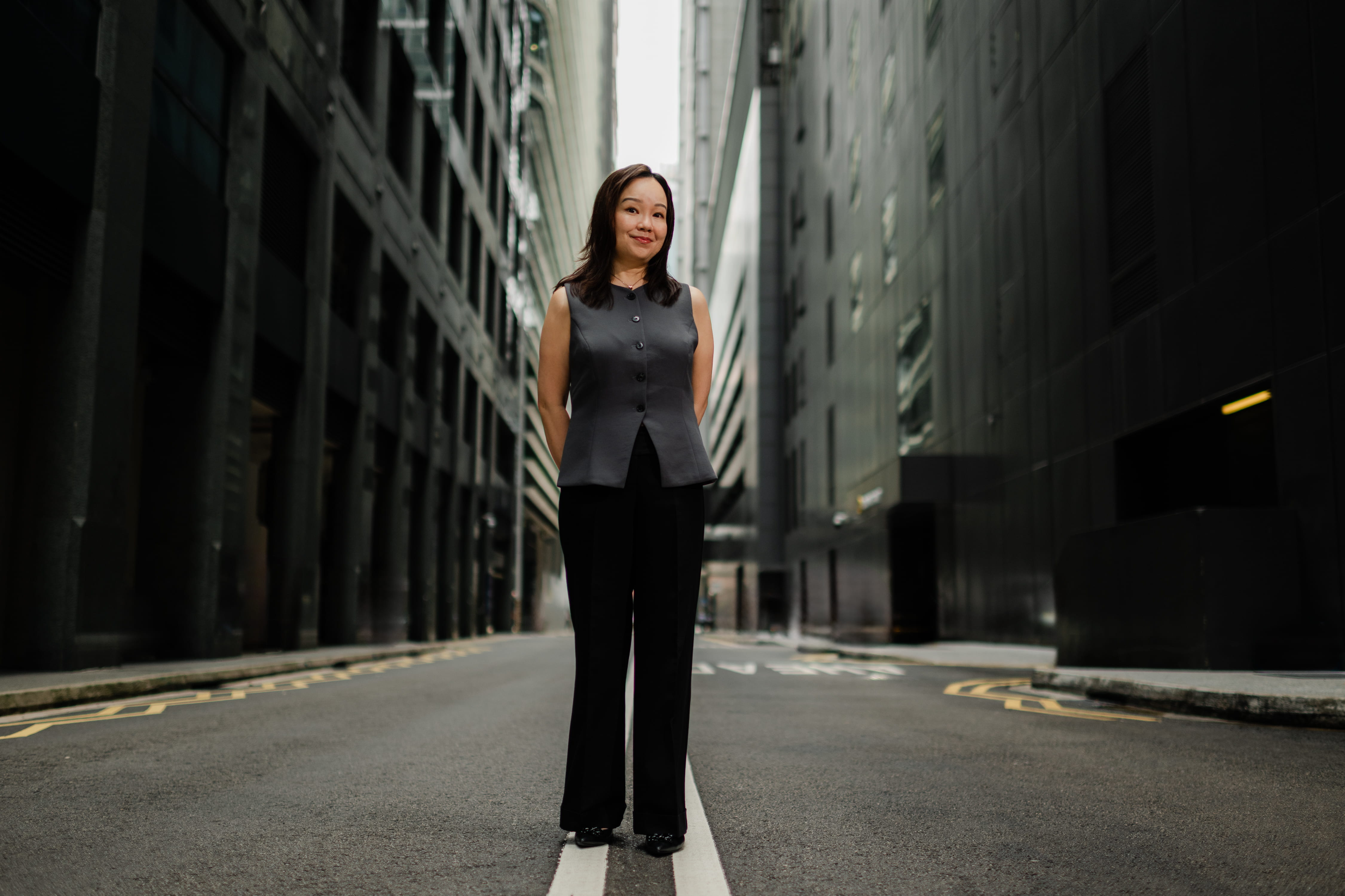 Debbie Lau posing on a city street