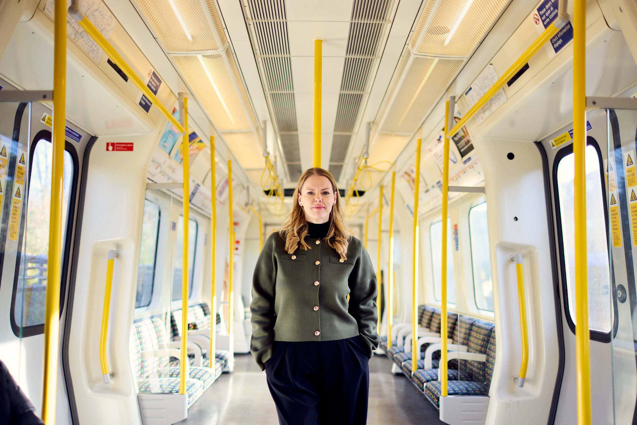 Howden's Kelly Clark posing in a bright, empty London Underground train