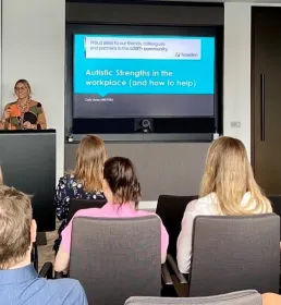 Carly Jones MBE speaking to the Howden team