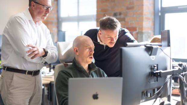 Bob, Ben and Tony at a workstation