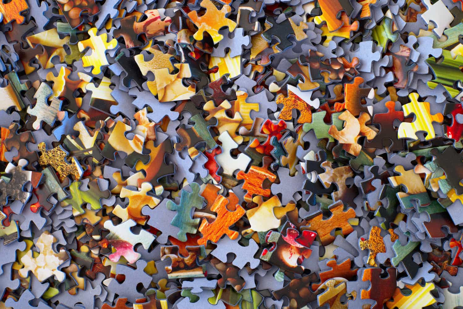 A pile of jigsaw pieces